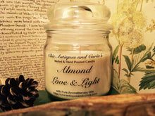 Load image into Gallery viewer, Almond with sweet lemongrass. Love and Light Candle collection.